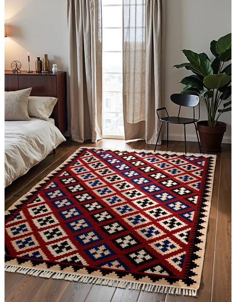 Červený obojstranný ručne tkaný vlnený koberec 120x170 cm Kamal Rami – Nouristan