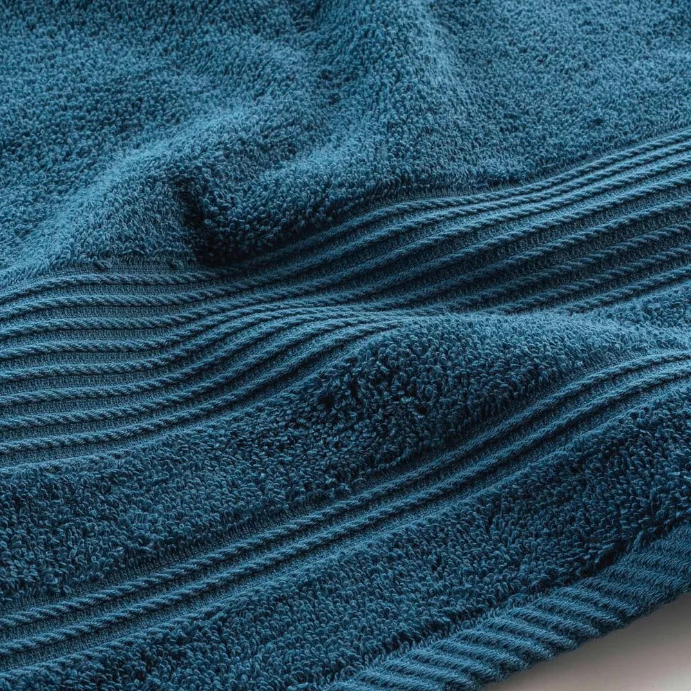 Tmavomodrá froté bavlnená osuška 70x130 cm Tendresse – douceur d'intérieur