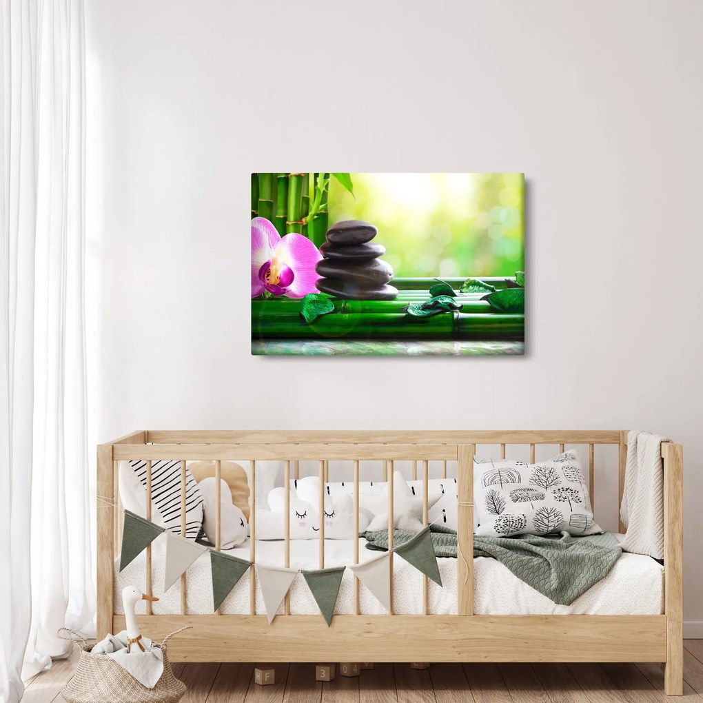 Obraz masážnych kameňov a orchidey na vode (90x60 cm)
