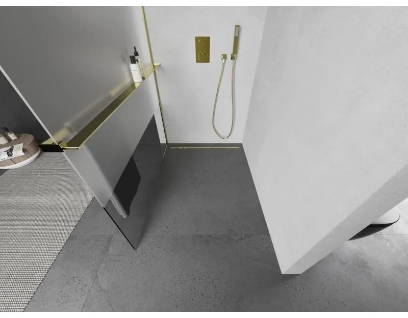 Mexen Kioto+ L, sprchová zástena Walk-In s poličkou a vešiakom 110 x 200 cm, 8mm číre sklo-námraza, zlatý lesklý profil,800-110-123-50-35