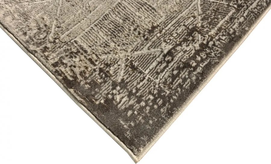 DC Koberec Oman 618 tmavá vizion zlatá Rozmer: 60×100 cm