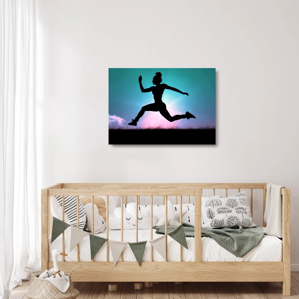 Sklenený obraz skákajúce siluety ženy (70x50 cm)