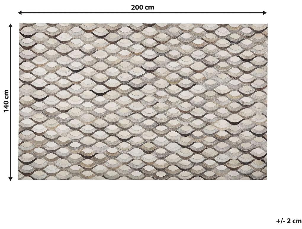 Kožený koberec 140 x 200 cm hnedá/béžová KIRCA Beliani