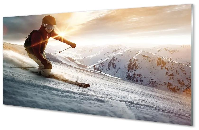 Obraz na skle lyžiarske palice muž 125x50 cm