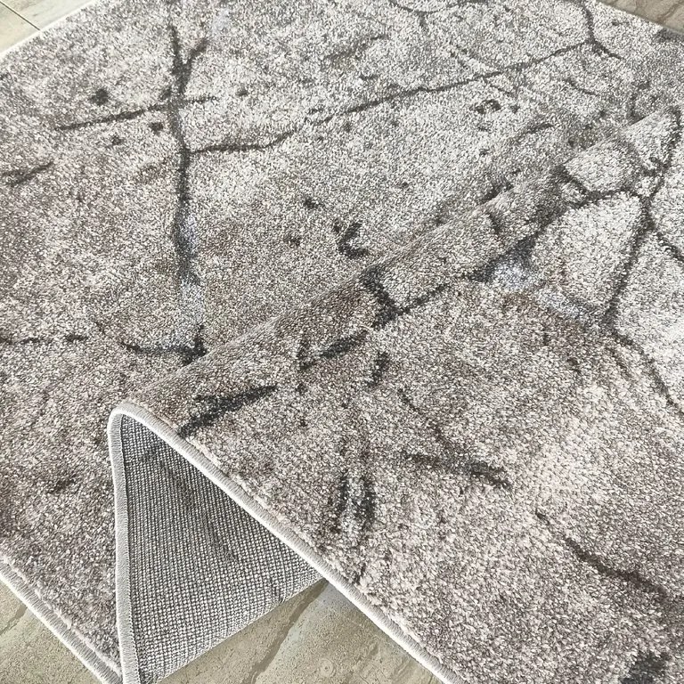 DY Béžový koberec s mramorovým vzorom Panamero 25 Rozmer: 60x100 cm