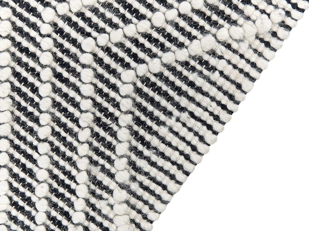 Vlnený koberec 160 x 230 cm čierna/biela SAVUCA Beliani