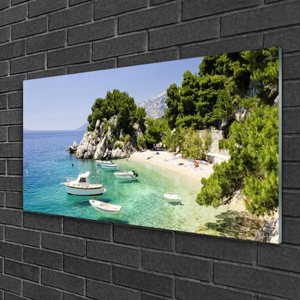 Skleneny obraz More pláž skaly lode 140x70 cm