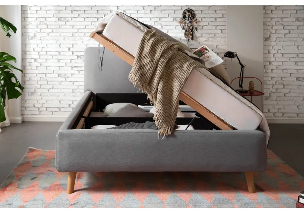 Sivá čalúnená dvojlôžková posteľ s úložným priestorom s roštom 140x200 cm Mattis – Meise Möbel