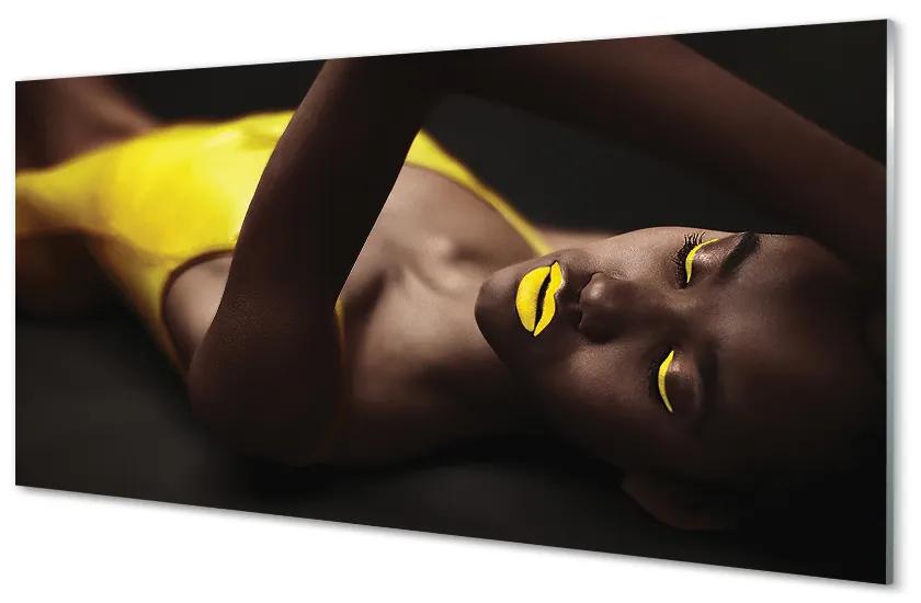 Obraz na skle Žena žltá ústa 140x70cm