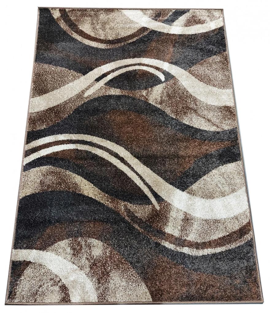 Originálny koberec s abstraktným vzorom v hnedej farbe
