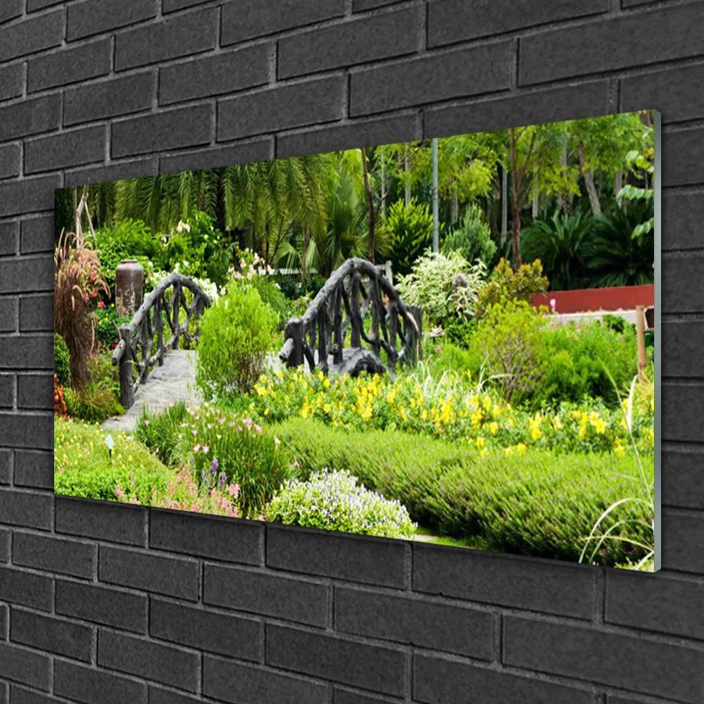 Obraz na skle Botanická záhrada most umenie 100x50 cm