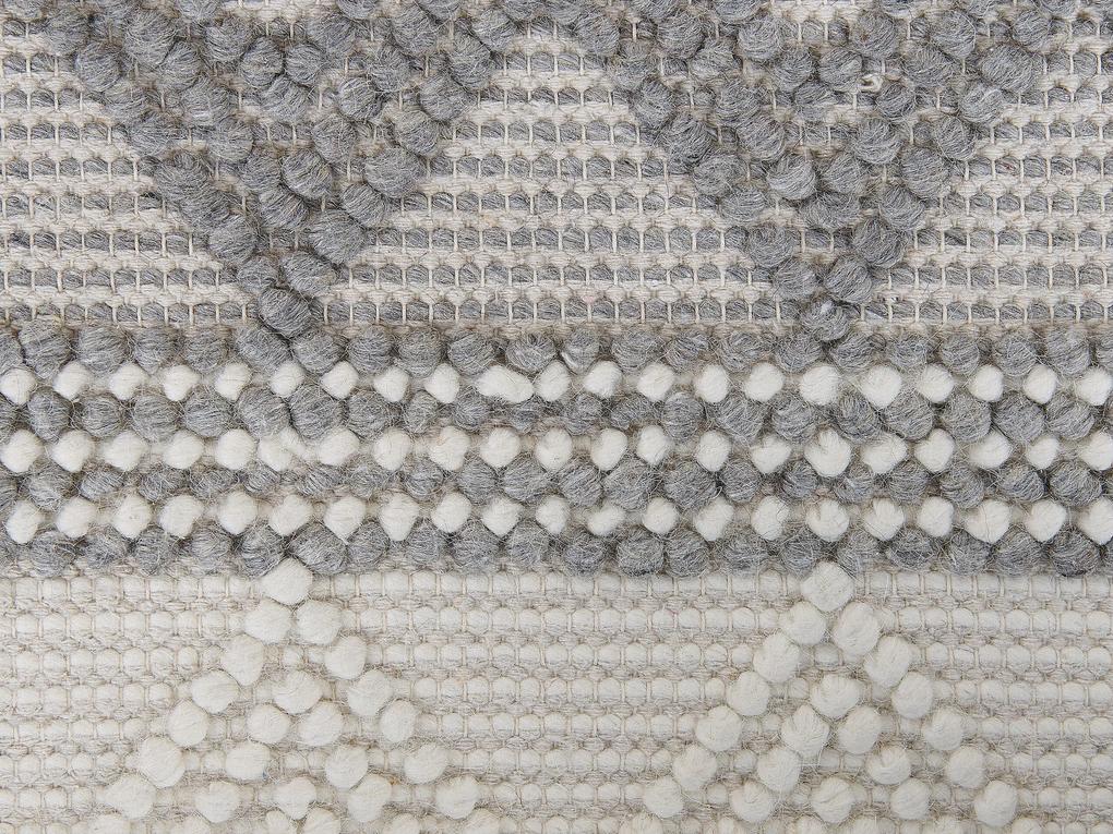 Vlnený koberec 140 x 200 cm svetlobéžová/sivá BOZOVA Beliani