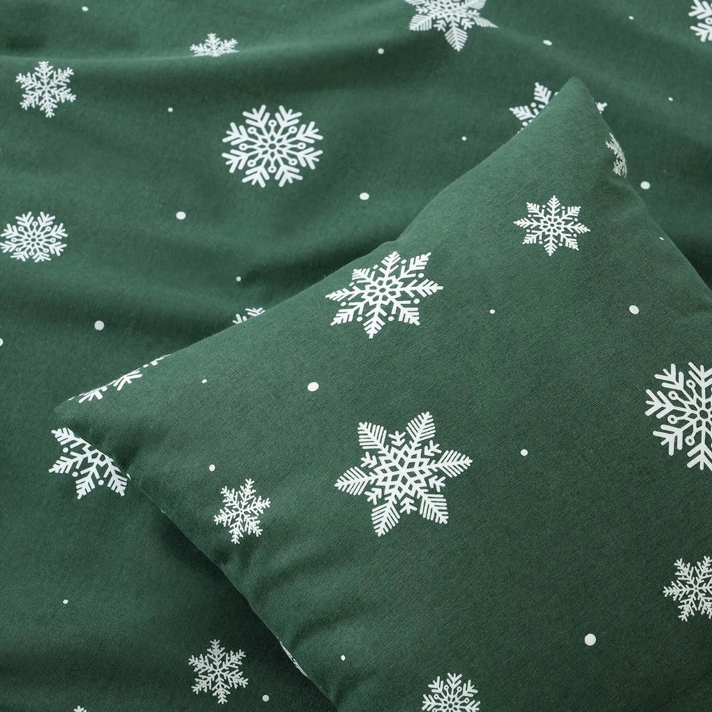 Goldea flanelová obliečka na vankúš - snehové vločky na zelenej 40 x 40 cm