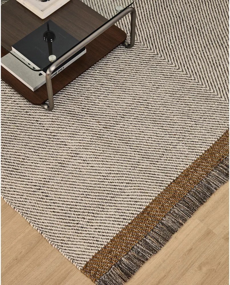 Krémový ručne tkaný vlnený koberec 160x230 cm Brina – Kave Home