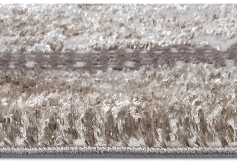 Koberec v béžovo-striebornej farbe 57x90 cm Shine Classic – Hanse Home