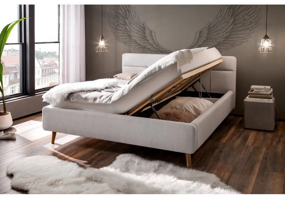 Svetlosivá čalúnená dvojlôžková posteľ s úložným priestorom s roštom 160x200 cm Lotte – Meise Möbel