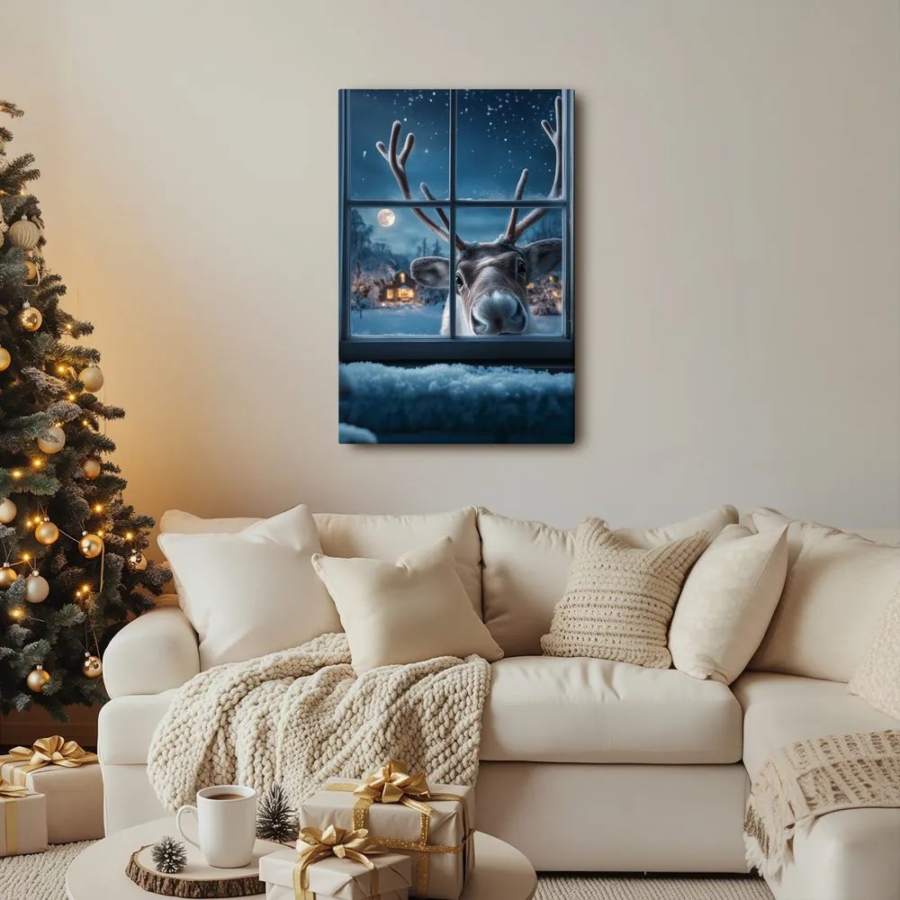 Vianočný obraz roztomilý sob za zasneženým oknom