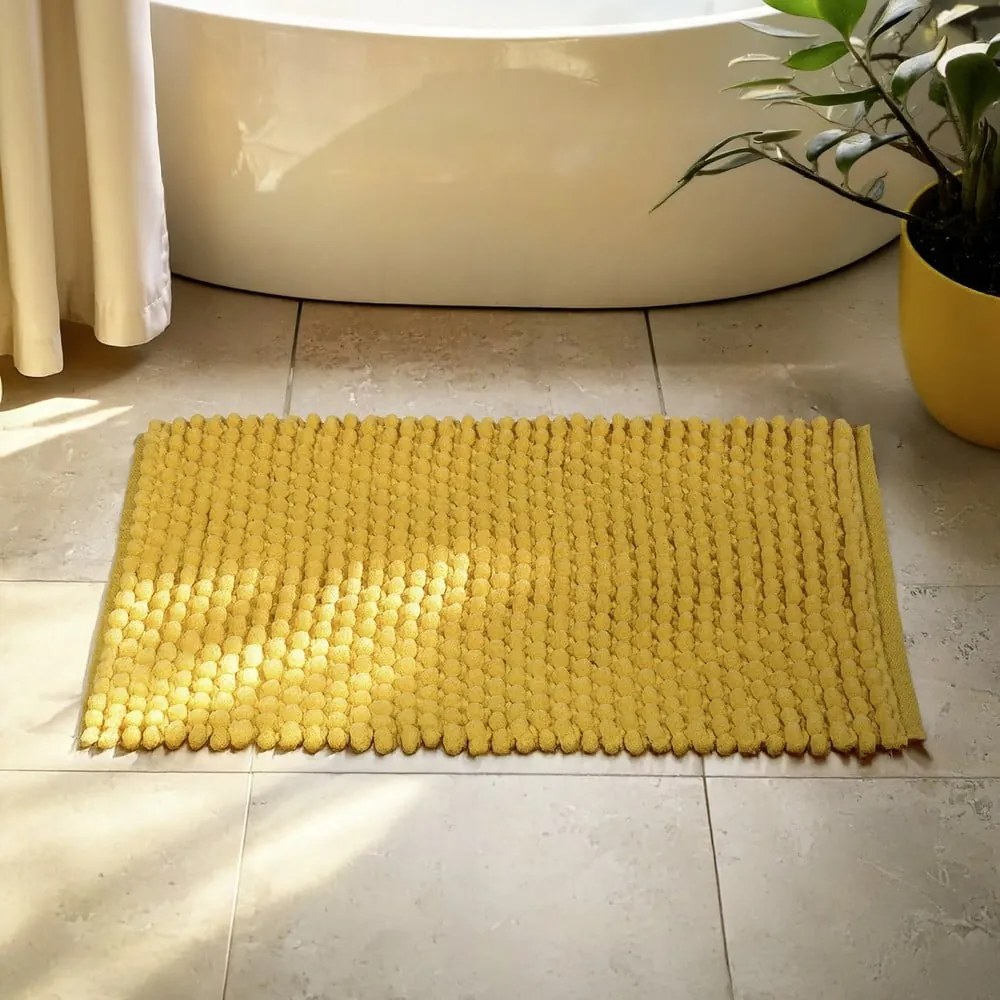 Žltá textilná kúpeľňová predložka 50x80 cm Solivo – Wenko