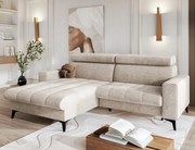 Krémová rohová sedačka s funkciou spania Bonito s nastaviteľnými opierkami hlavy.