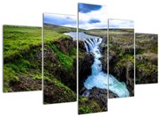 Obraz vodopádu medzi skalami (150x105 cm)