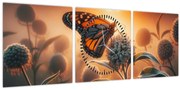 Obraz – Motýľ v zapadajúcom slnku (s hodinami) (90x30 cm)