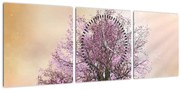 Obraz rozkvitnutého stromu na vrchole kopca (s hodinami) (90x30 cm)
