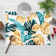 Biante Bavlnené prestieranie na stôl Sandra SA-500 Modrozelené a zlaté tropické listy 30x40 cm