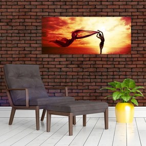 Obraz - Silueta ženy v západu slnka (120x50 cm)