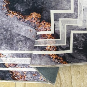 Protišmykový koberec tmavosivej farby so vzorom