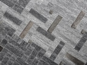 Kožený koberec 140 x 200 cm sivý DARA Beliani