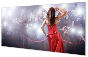 Obraz na skle Samice červené šaty ľudia 140x70 cm