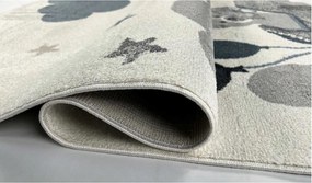 TA Béžový detský koberec s medvedíkom v autíčku a hviezdičkami Rozmer: 80x150 cm