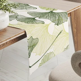 Biante Bavlnený behúň na stôl Sandra SA-576 Zelené Ginkgo listy na bielom 45x140 cm