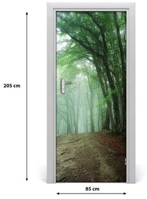 Fototapeta na dvere samolepiace hmla v lese 85x205 cm