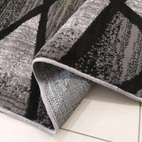 Moderný sivo čierny koberec s abstraktným vzorom Šírka: 80 cm | Dĺžka: 150 cm
