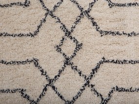 Bavlnený koberec 140 x 200 cm béžová/čierna MALTEPE Beliani