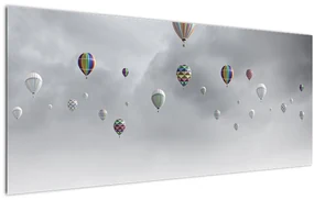 Obraz - Balóny nad tehlovou stenou (120x50 cm)