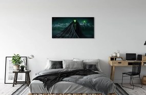 Obraz canvas Temná postava zeleného ohňa 125x50 cm