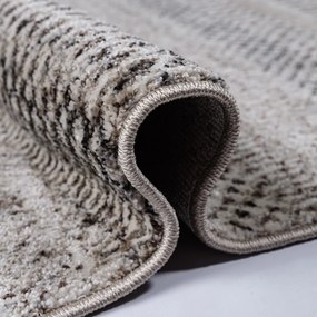 Kvalitný koberec s abstraktným vzorom v prírodných odtieňoch Šírka: 60 cm | Dĺžka: 100 cm