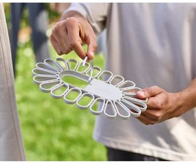 Béžový závesný sušiak na bielizeň Petal – Joseph Joseph