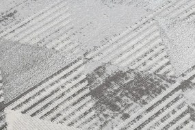 Behúň LIRA E1627 Trojuholníky geometrický, štrukturálny, glamour - sivý