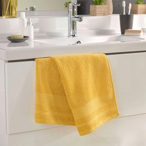 Žltý froté bavlnený uterák 50x90 cm Tendresse – douceur d'intérieur