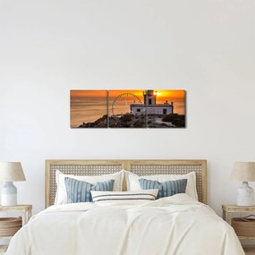 Obraz majáka pri západe slnka (s hodinami) (90x30 cm)