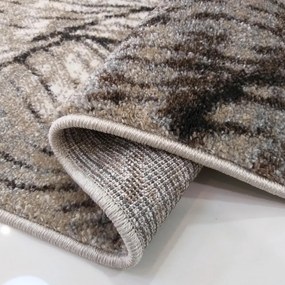 Nádherný koberec s motívom pripomínajúcim jesenné lístie