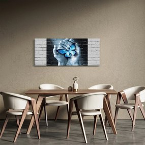 Obraz modrého motýľa na stene (120x50 cm)