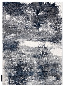 Moderný koberec DE LUXE 528 Abstrakcia - Štrukturálny krém  / tmavomodrý