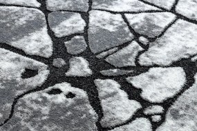 Moderný koberec COZY 8873 Cracks, prasknutý betón, tmavosivý