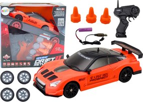 LEAN Toys Športové autíčko s diaľkovým ovládaním R/C v mierke 1:24, oranžové, s vymeniteľnými kolesami