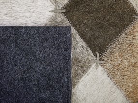 Kožený koberec 140 x 200 cm sivá/hnedá BANAZ Beliani