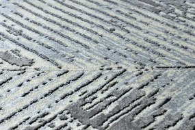 Koberec DE LUXE 2087 Jodelka Chevron vintage - zlatý / sivý